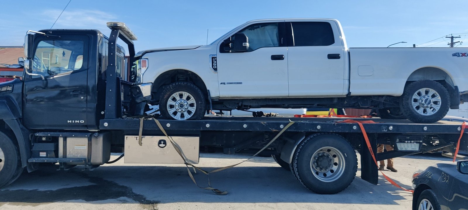 Side accident damage on 2021 Ford F-350 Heavy Duty 4x4 truck from Vancouver Island removed by Cash Car BC